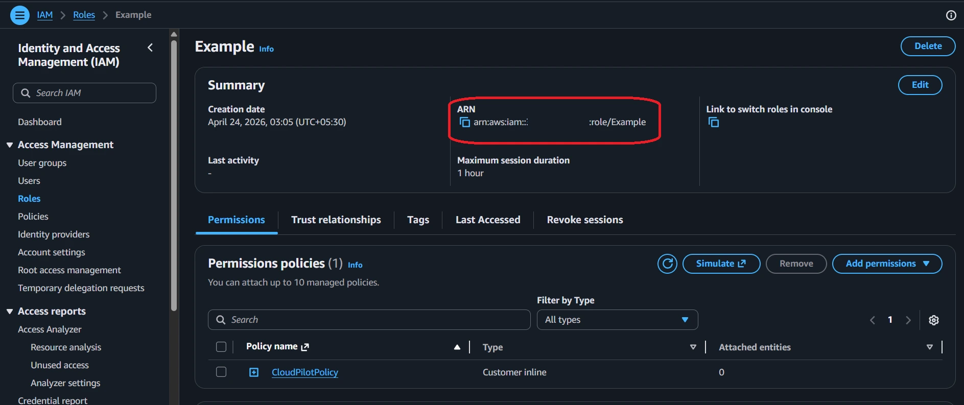 IAM role summary page with the role ARN highlighted.